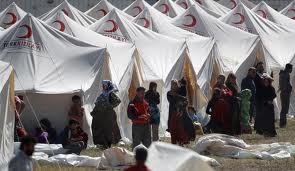Des réfugiés syriens à la frontière turque