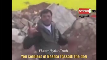 Un rebelle syrien en train de manger le coeur d'une victime pro-Assad