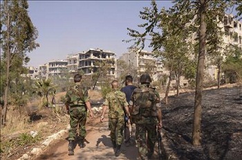 Soldats syriens à proximité du quartier Sleimane l'Aleppin ( 20-6-13)