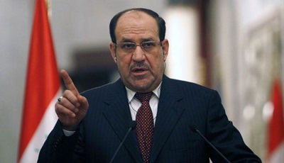 Irak: Maliki porte plainte contre le président, Kerry le met en garde