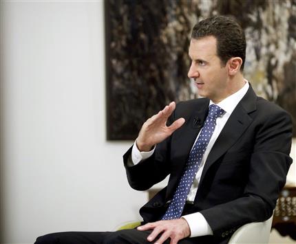 Assad à Riyad: pas question de négocier avec des hommes armés