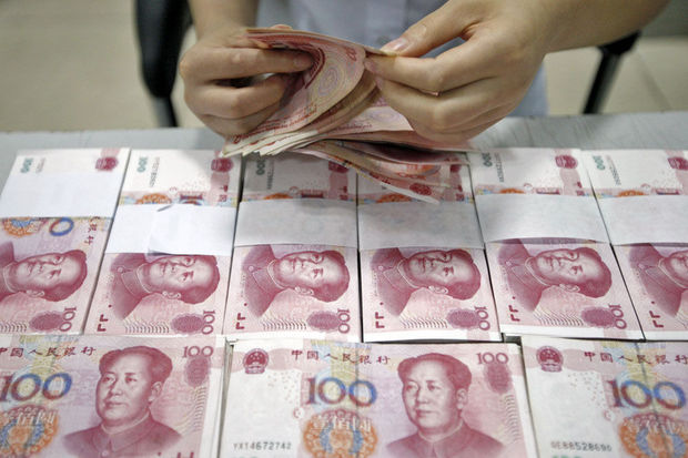 Pékin abaisse le taux du yuan à son plus bas niveau depuis un mois