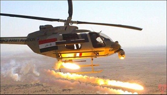 Helicópteros iraquíes destruyen convoy de los terroristas en Siria
