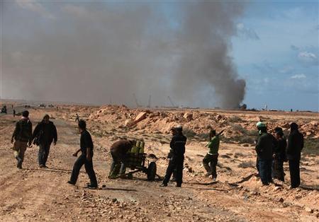 نظام القذافي يشن هجوما مضادا على الثوار ويتهم الغرب بالتآمر لتقسيم ليبيا